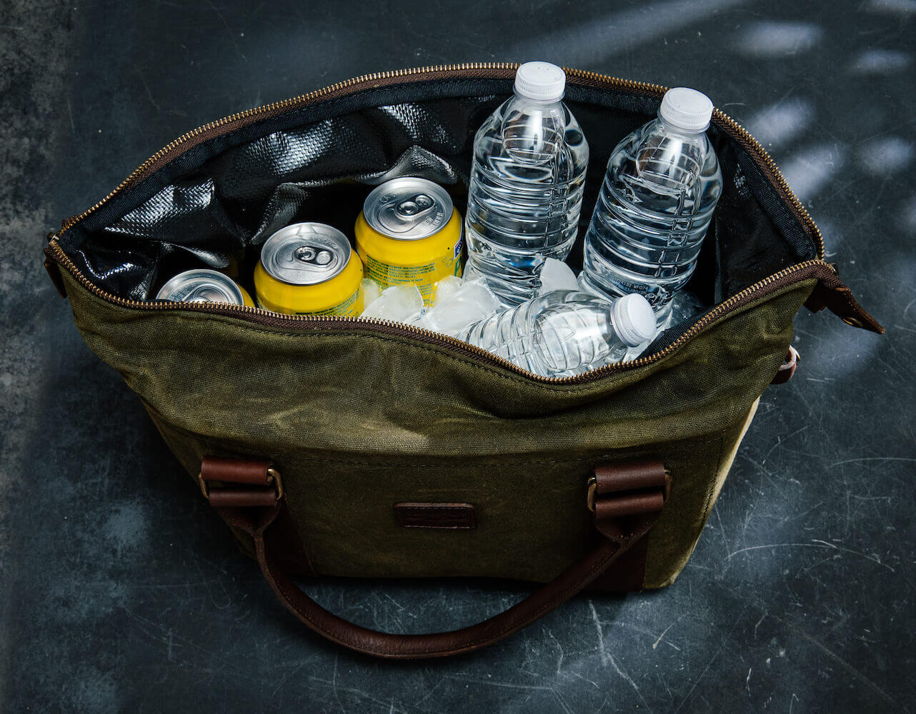White Wing Waxed Canvas Cooler-Accessories > Beverage Carriers & Coolers > Waxed Canvas-Smoke-Forest-Mission Mercantile Leather Goods holding ice and drinks